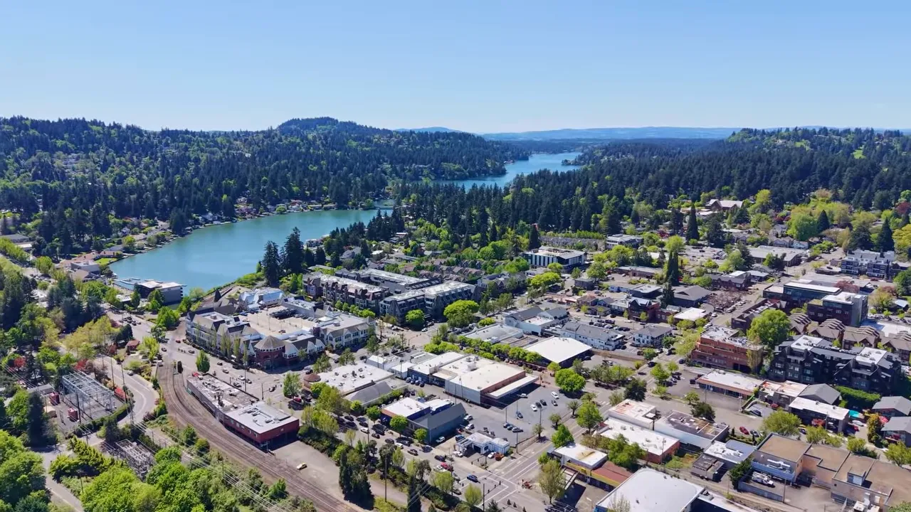 Aerial view of Lake Oswego town center and the lake surrounded by trees
