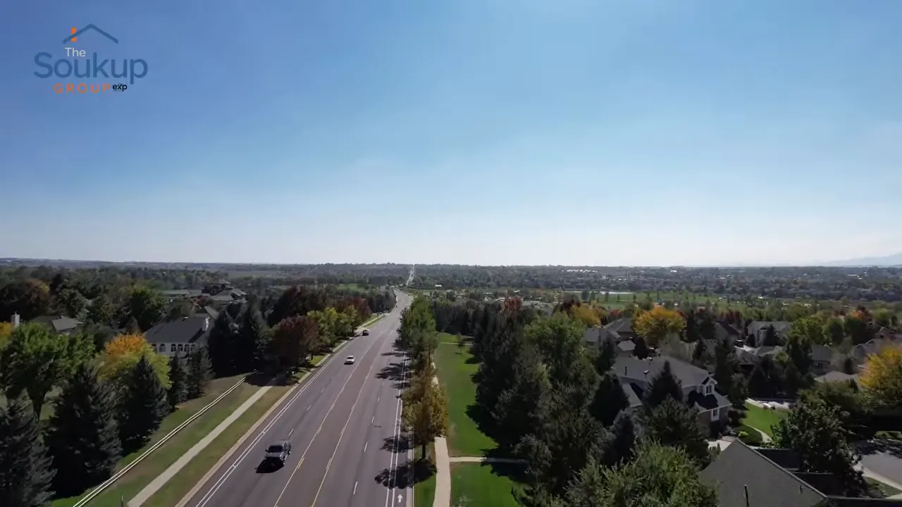 Aerial view of suburban streets and neighborhood greenery in Fort Collins, Colorado