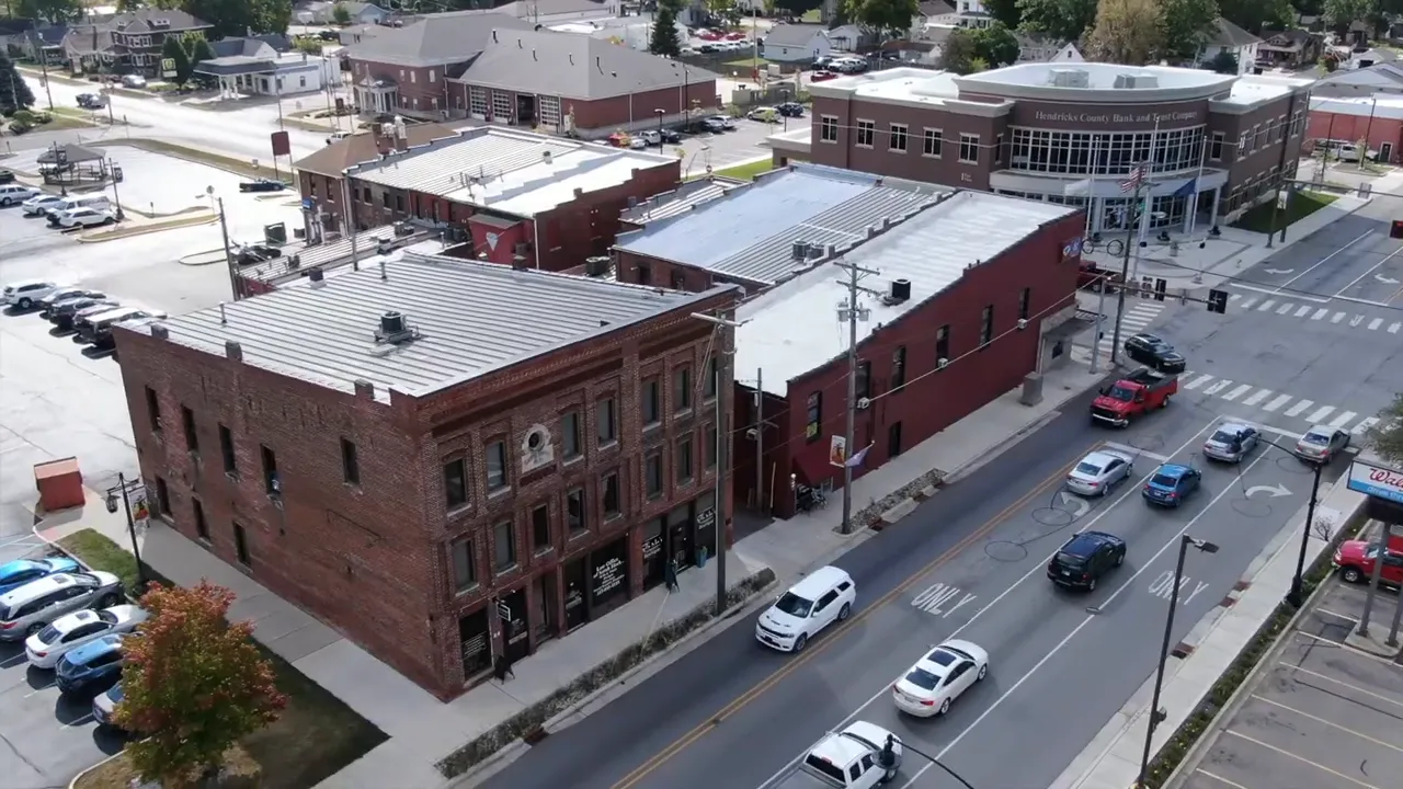 Aerial view of brick commercial buildings and streets in downtown Brownsburg