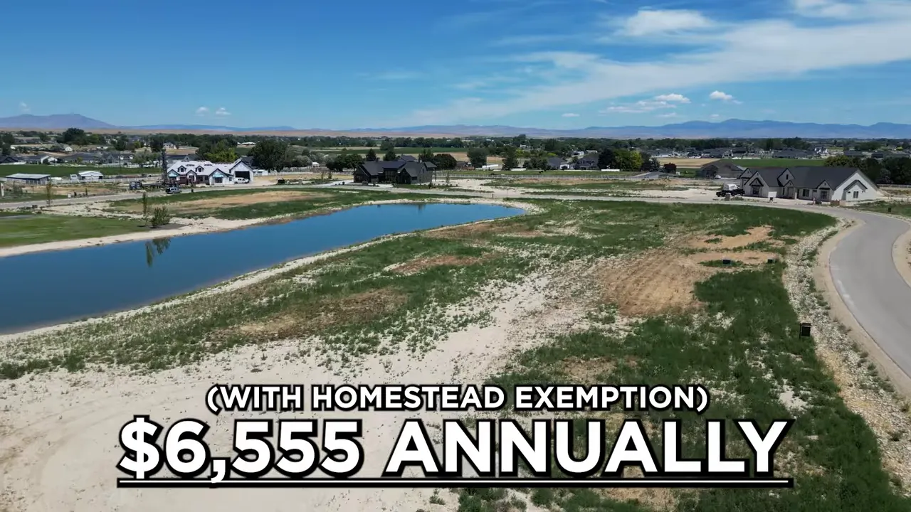 Aerial neighborhood view with text showing annual property taxes of 6555 dollars