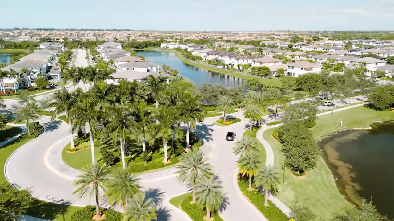 Aerial view of a Parkland Florida residential community with winding roads and lakes