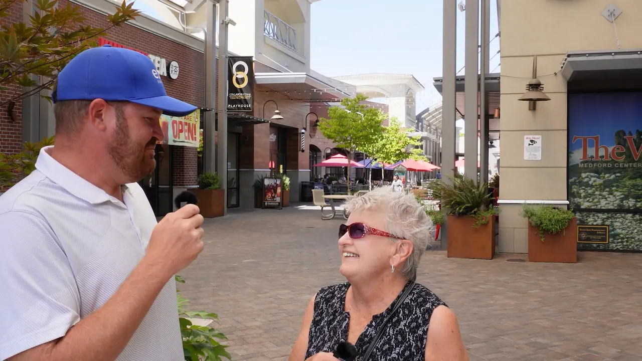 Open country road heading out of a busy city environment