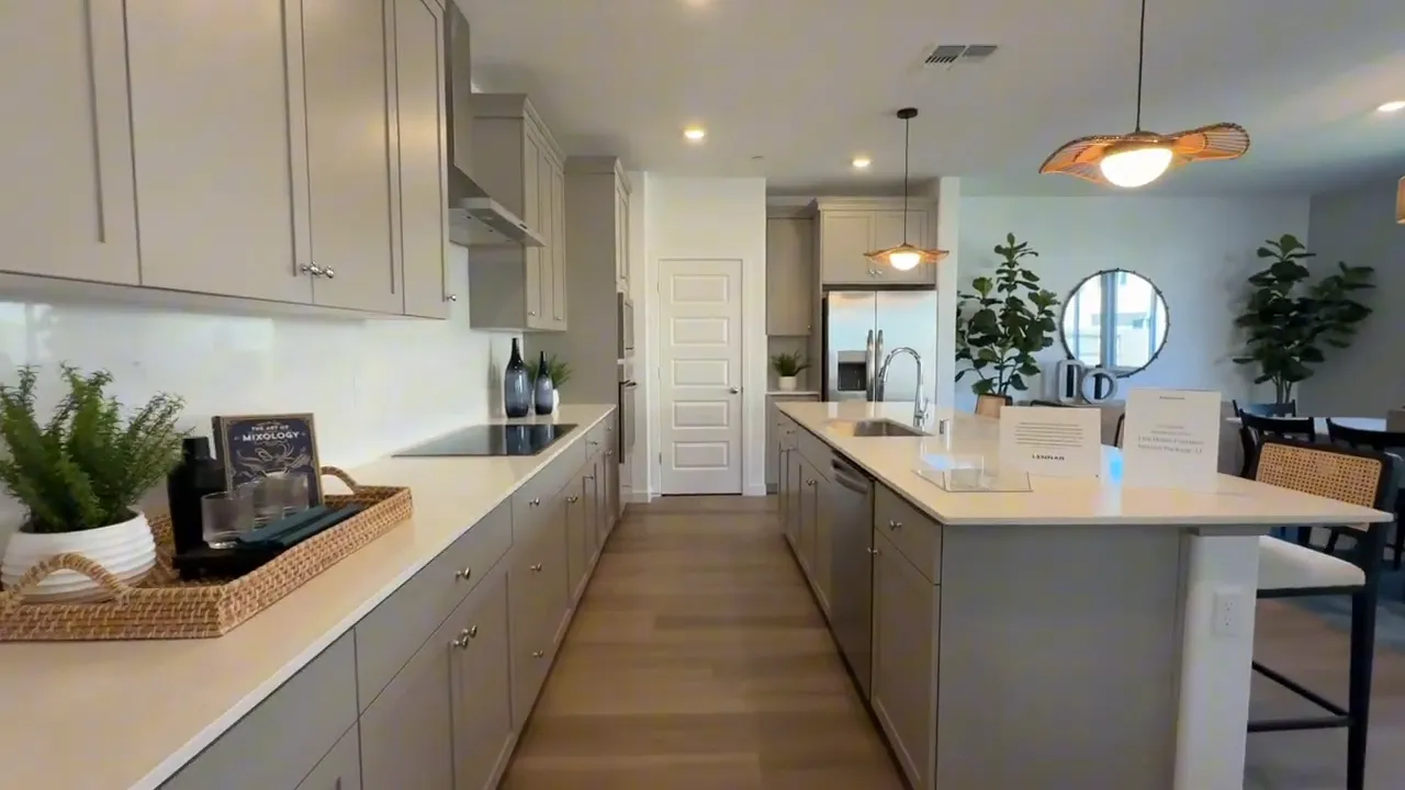 Elk Grove Arbor Ranch kitchen with island and open view to the dining area