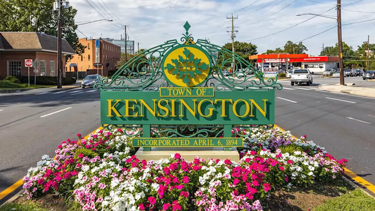 Kensington Maryland welcome sign surrounded by colorful flowers