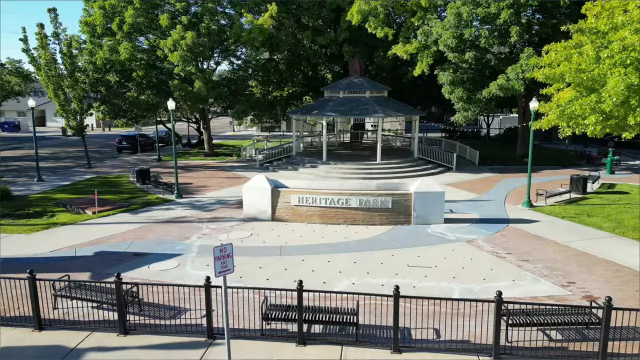 Heritage Park gazebo and plaza in downtown Eagle, Idaho with benches and shade trees