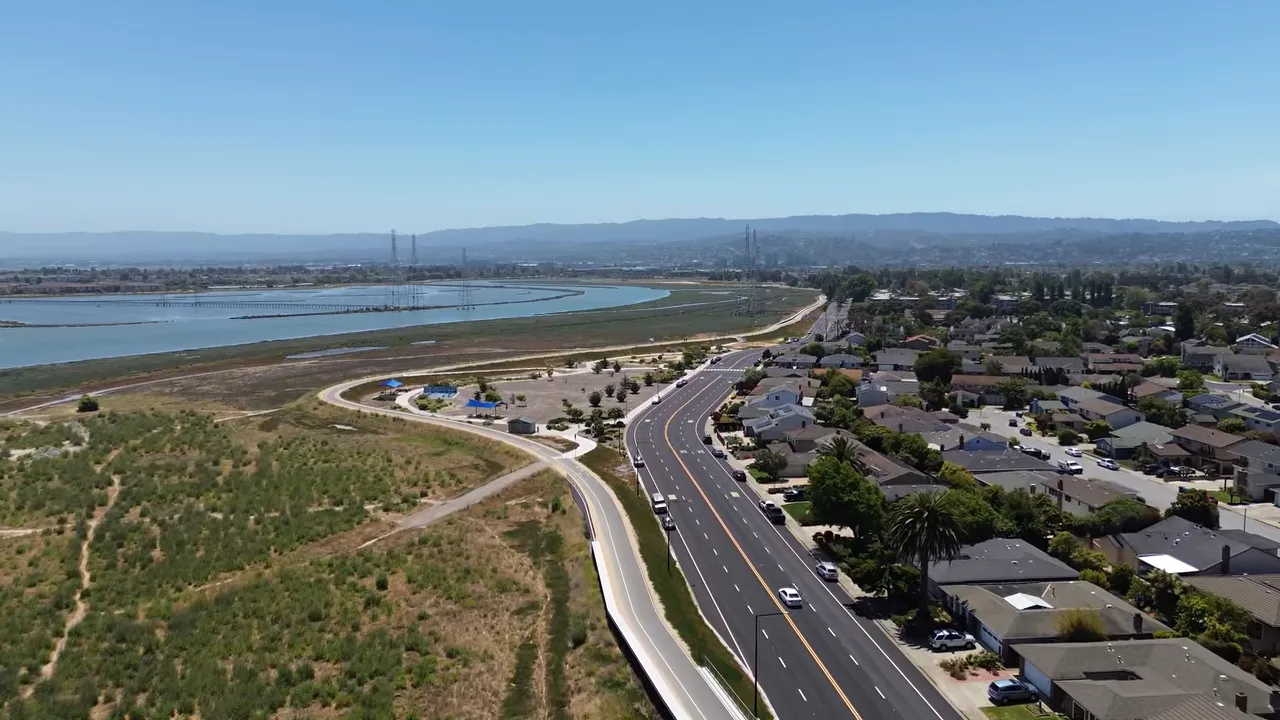 Aerial view of San Mateo Bay-side neighborhoods and highways