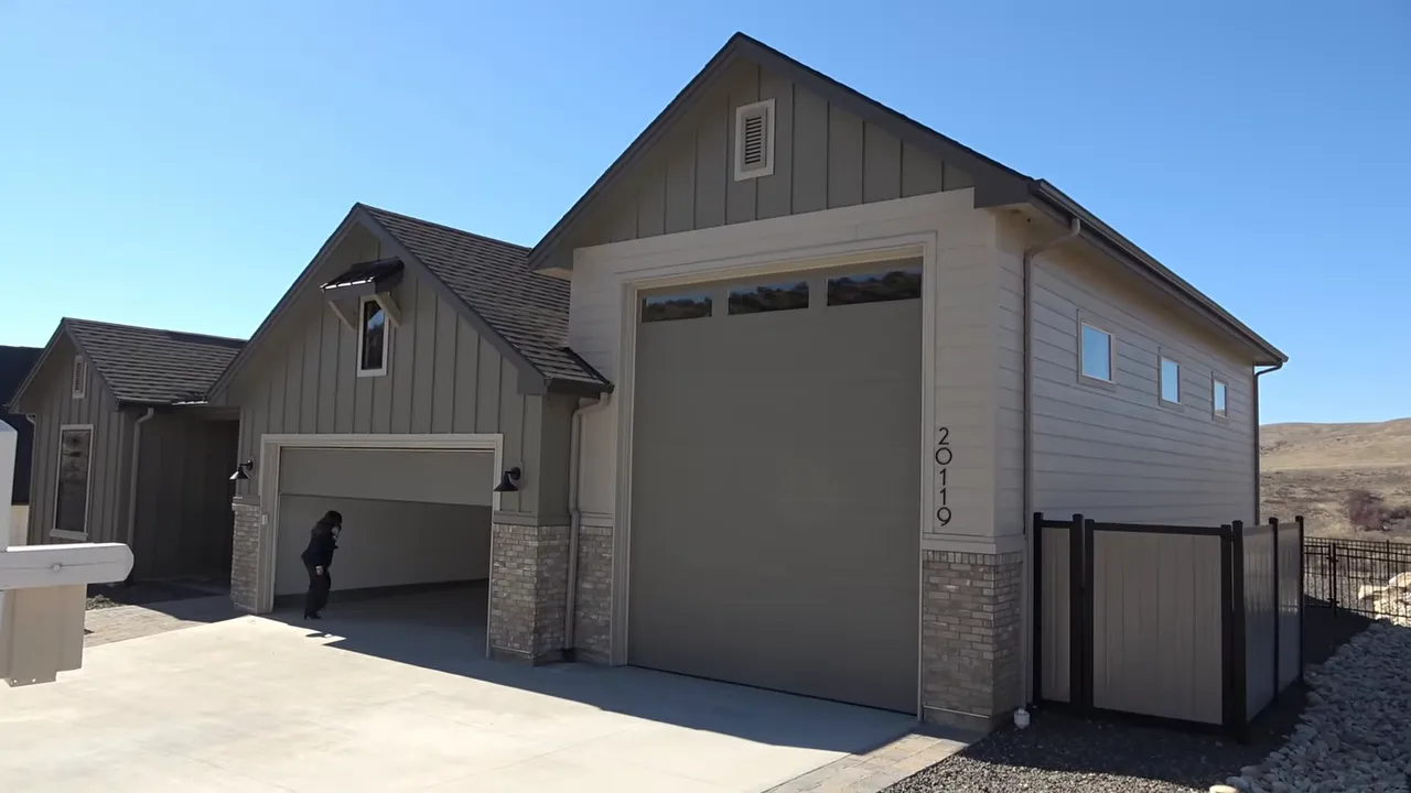 Home with a tall RV bay garage in Avimor