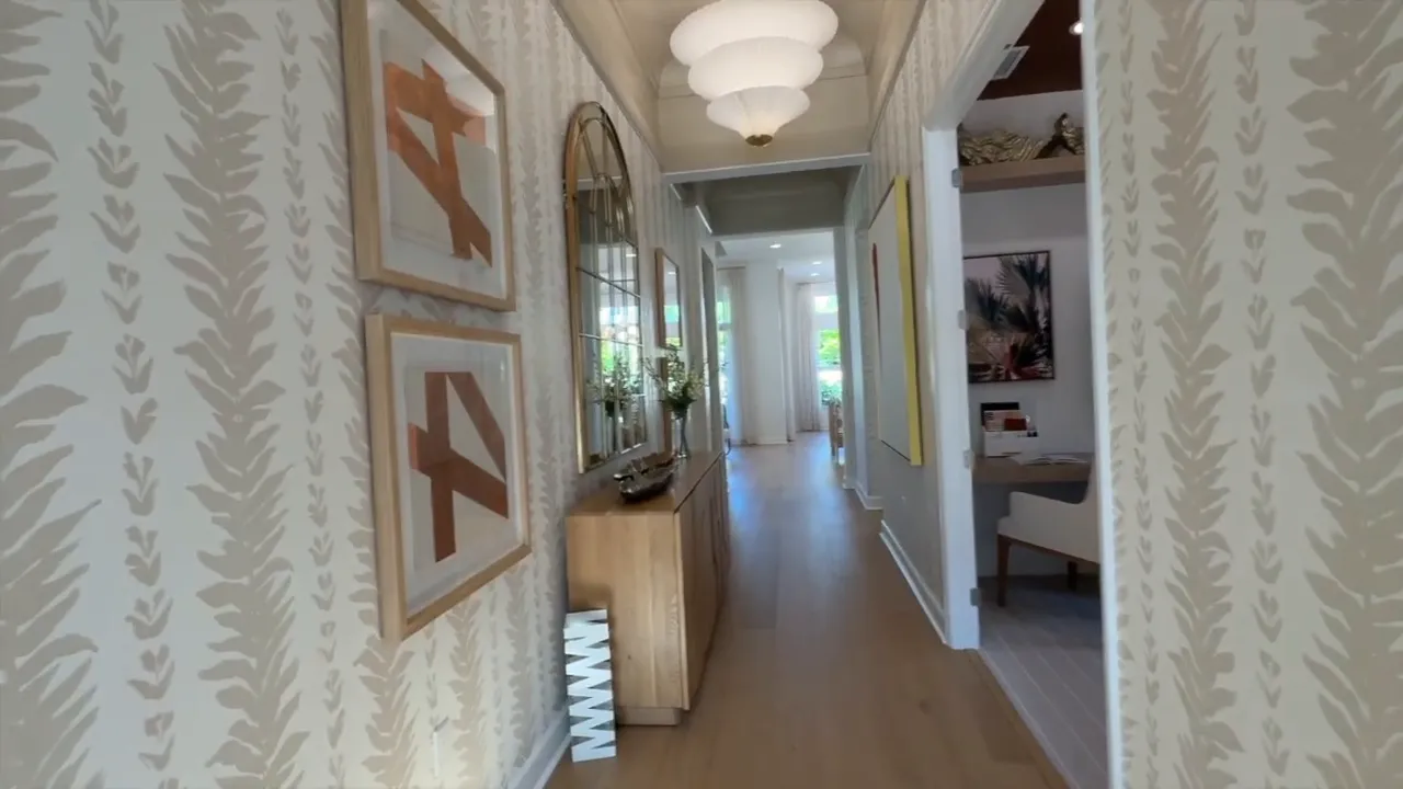 Stellar floor plan hallway view with windows and open passageway in Valencia Sky Naples