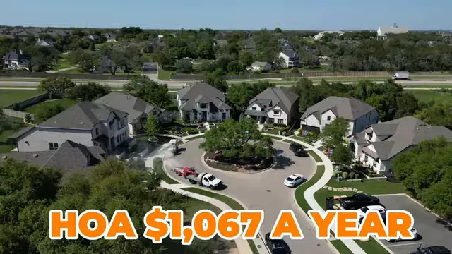 Aerial neighborhood view with text showing HOA 1067 a year