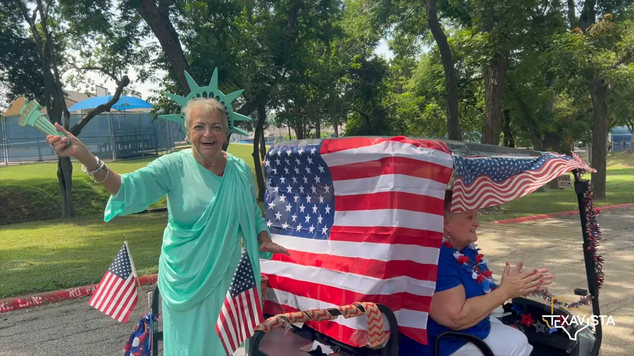 Residents waving American flags during a patriotic parade in Rockwall Texas