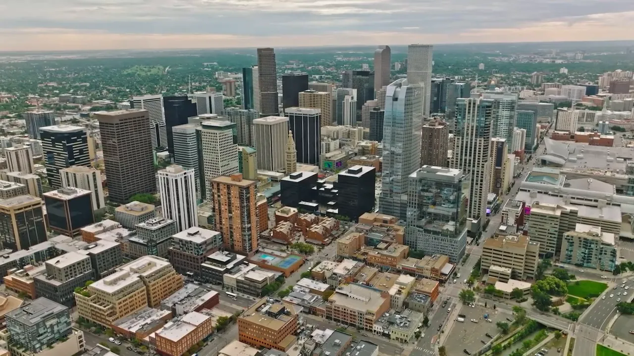 Denver skyline with 600000 displayed on screen