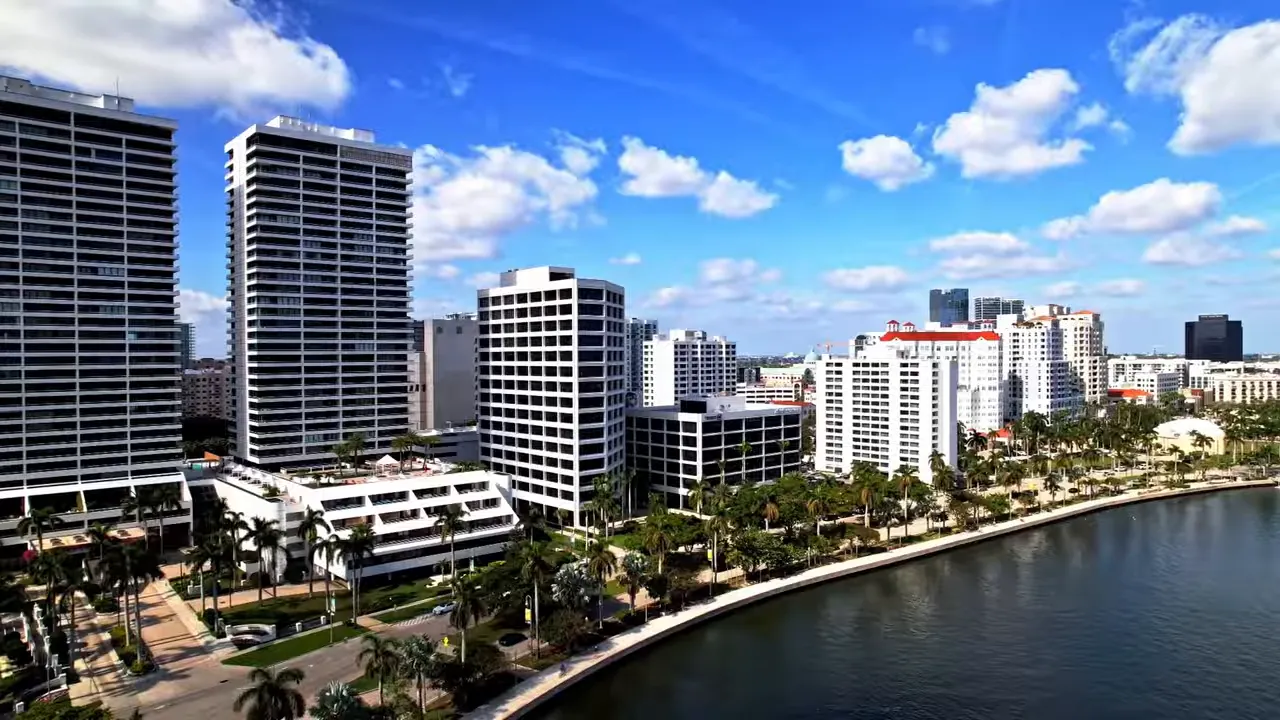 Aerial view of the Intracoastal Waterway with downtown buildings and sailboats