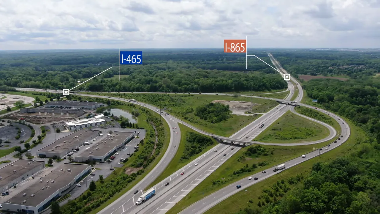 Aerial view showing I-465 and I-865 with labeled freeway ramps