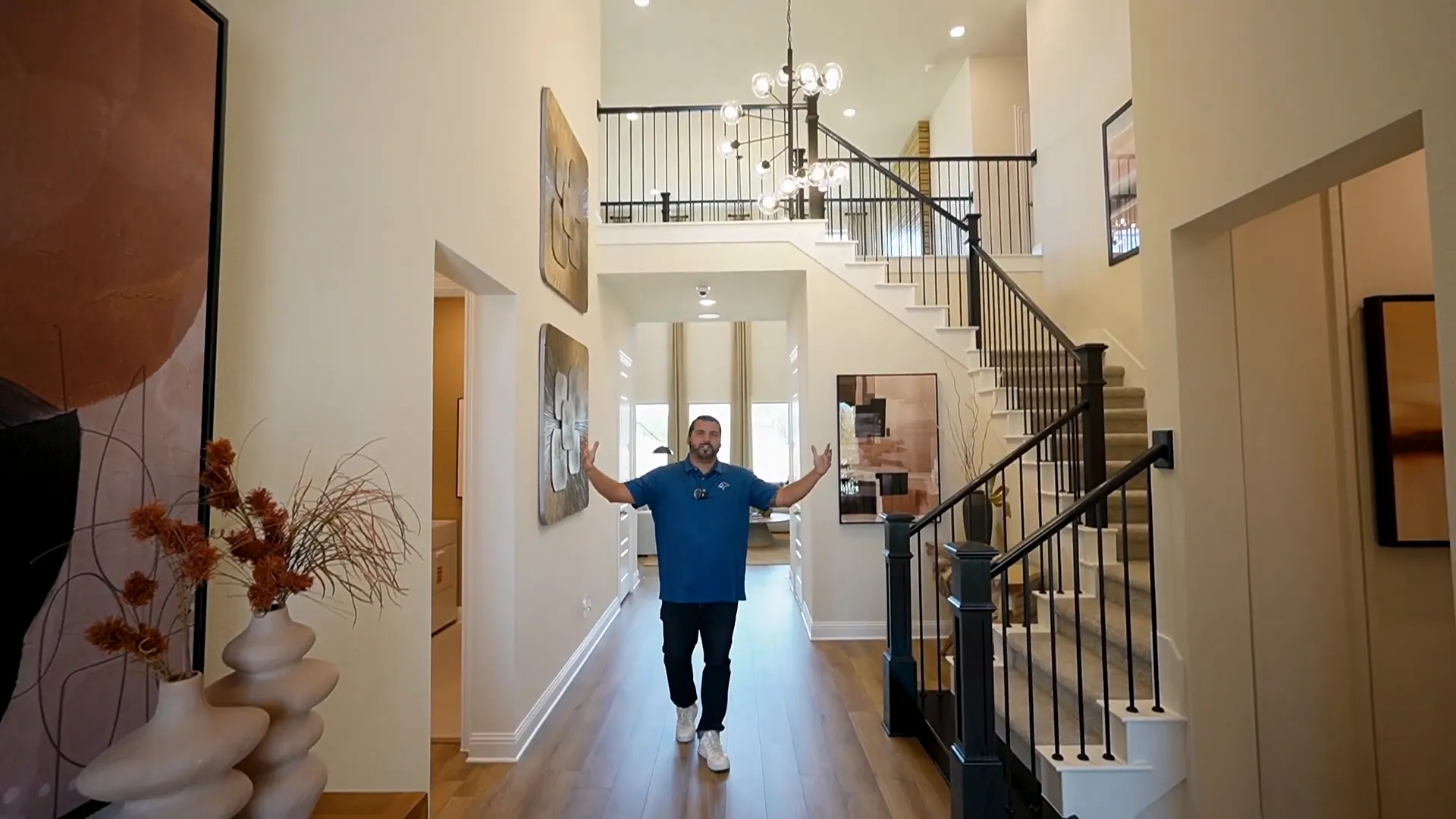 Grand entry with two-story ceilings and open railing system