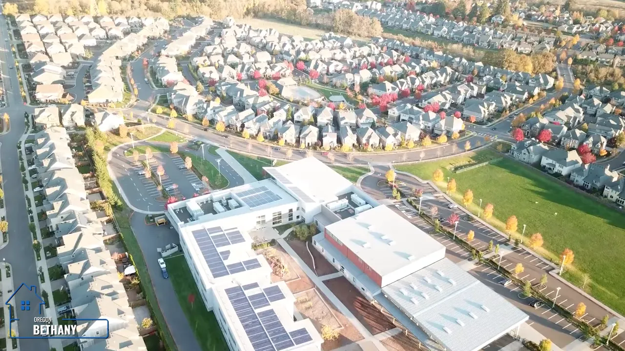 Aerial view of dense planned neighborhoods and sports fields in Bethany