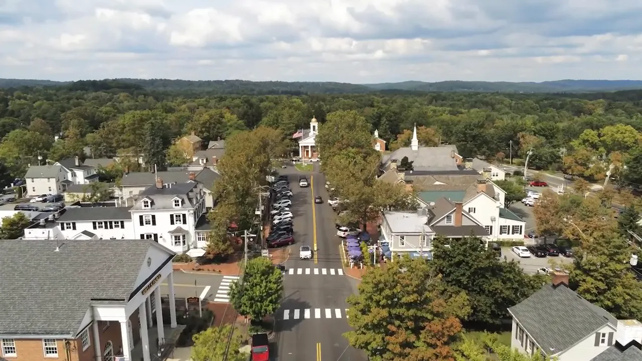 Aerial neighborhood view in Bernards Township, New Jersey showing main roads and community buildings