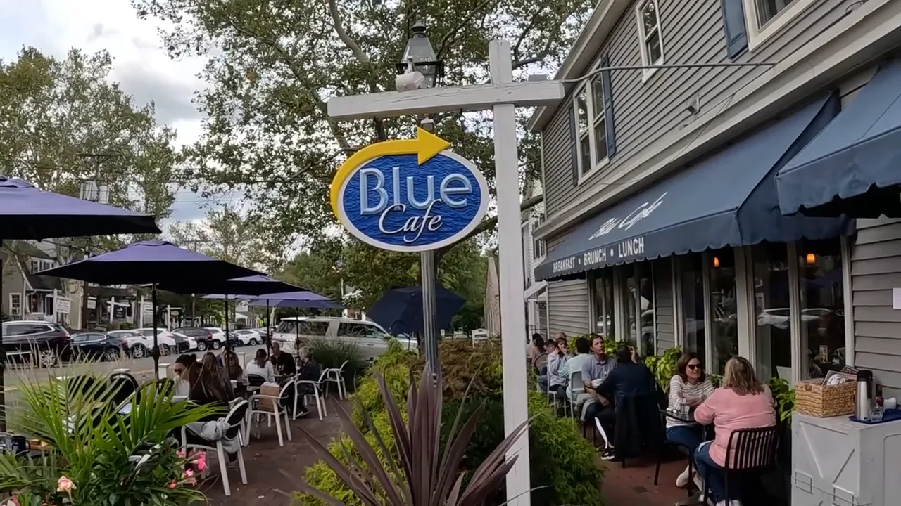 Blue Cafe sign outside a downtown restaurant area in Basking Ridge