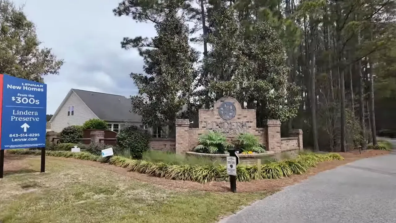 Lindera Preserve brick entrance sign and Lennar new homes banner at the neighborhood entry