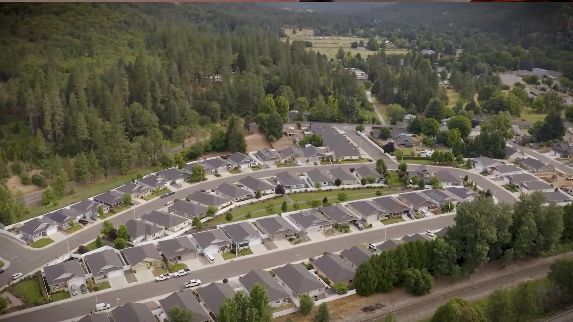 Medford neighborhood with mature trees and mix of homes