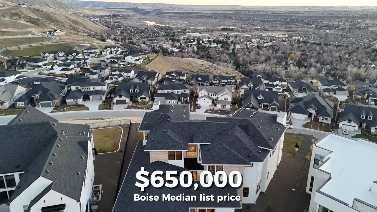Aerial view of hillside homes with text showing a Boise median list price of 650000 dollars