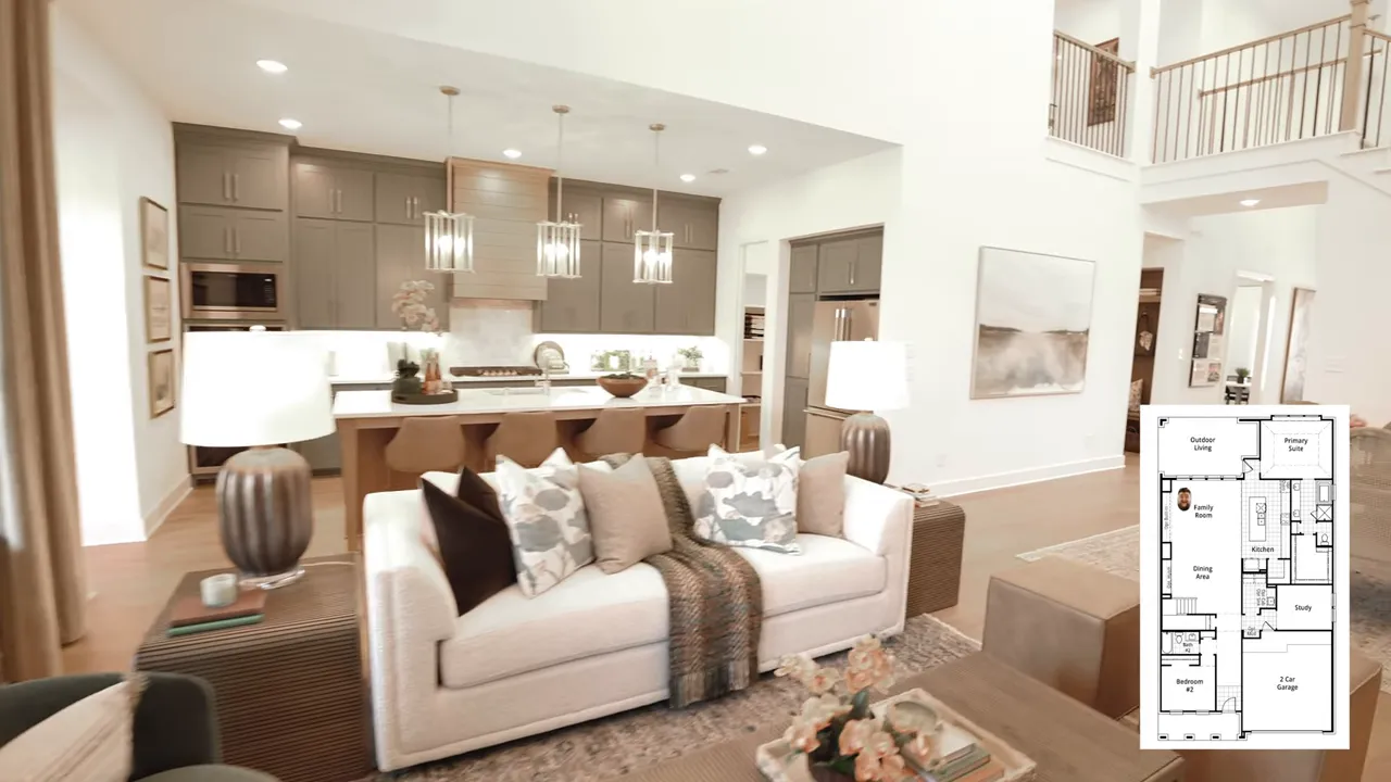 Open living room kitchen and dining area with two story ceiling