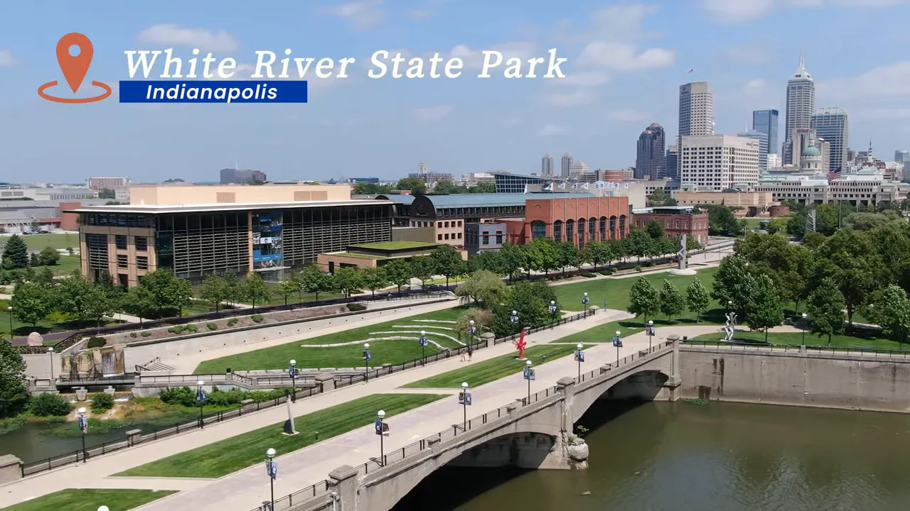 Aerial view of White River State Park bridge river and Indianapolis skyline