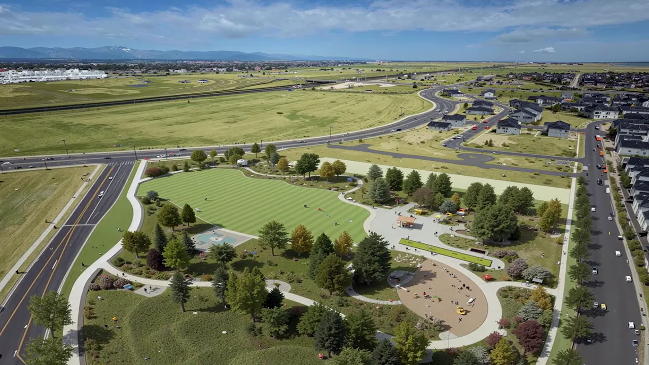 Aerial view of roads and green spaces in Aurora Highlands master planned community near Denver CO