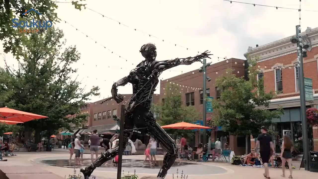 Sculpture in a busy Old Town Fort Collins plaza