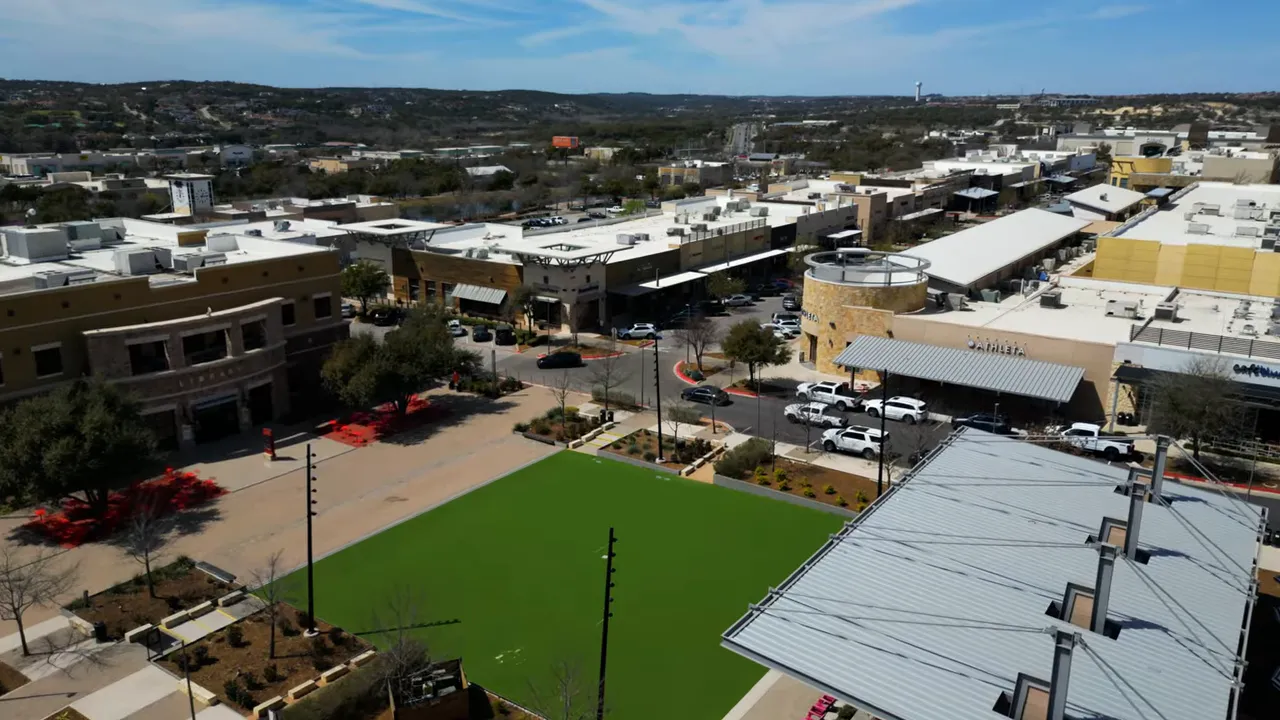 Aerial view of Hill Country Galleria shopping center buildings and walkways