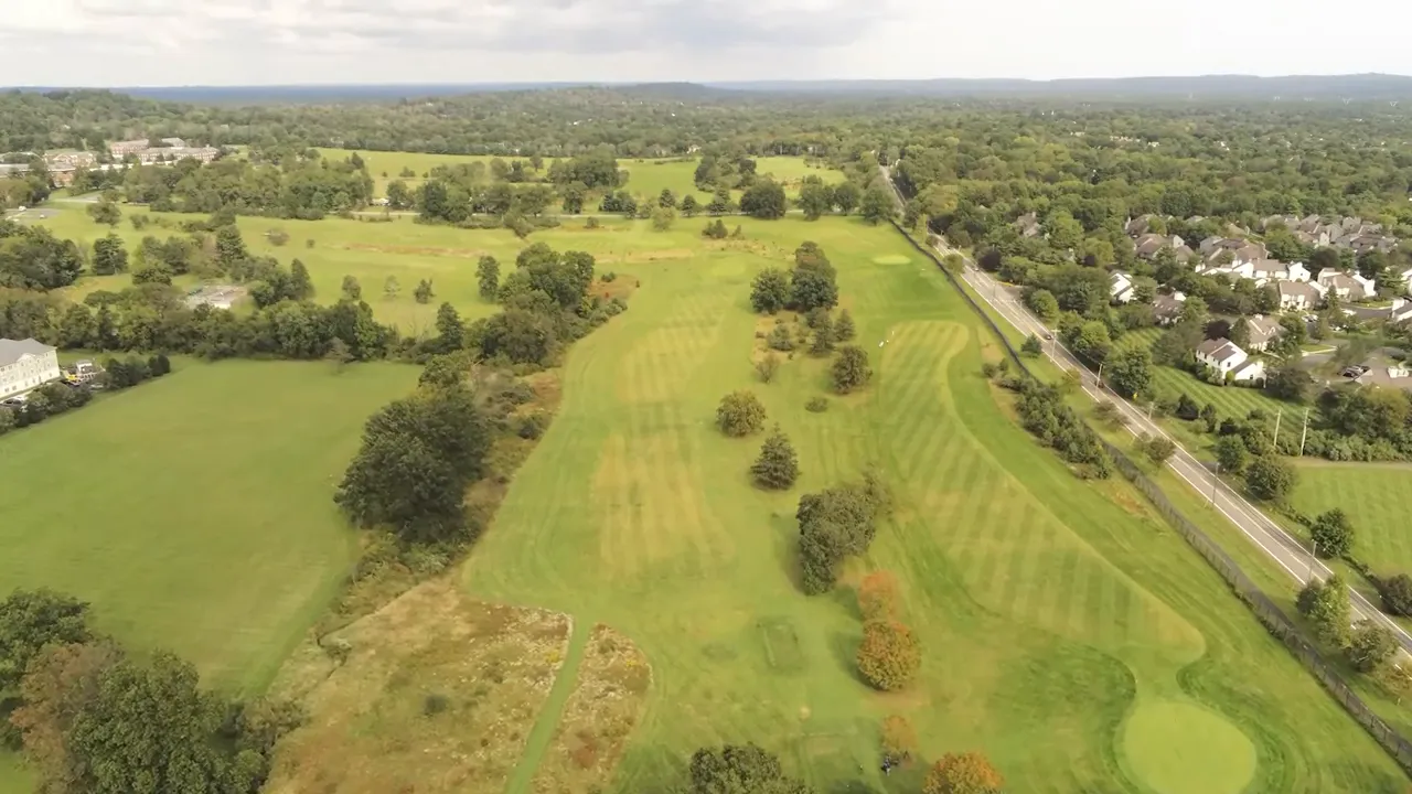 Aerial view of open countryside fields and rural roads near Bernards Township New Jersey