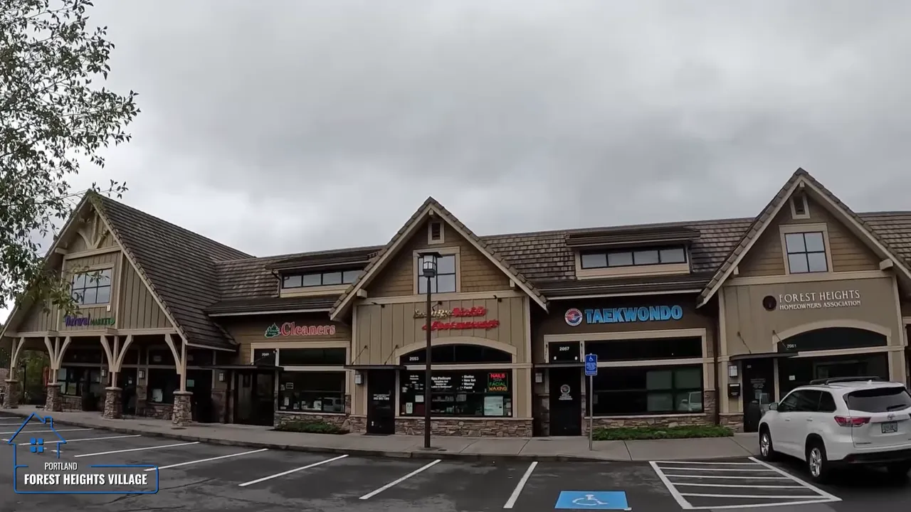 Forest Heights Village storefronts and parking area