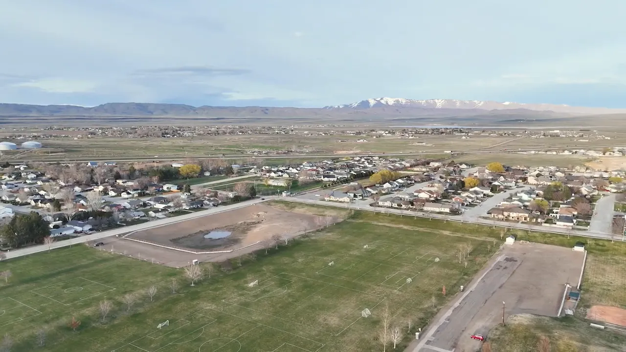 Aerial view of Mountain Home Idaho parks and sports fields with mountains in the distance