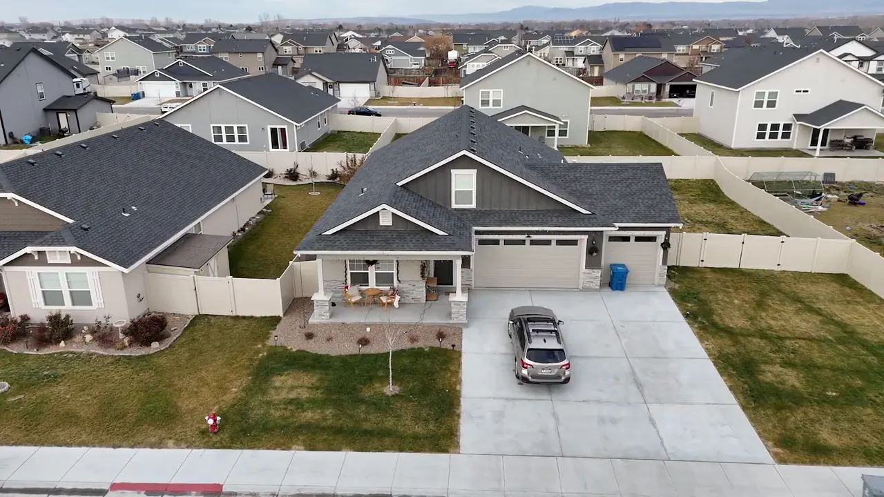 Aerial view of a modern residential street with newer homes in Mountain Home, Idaho