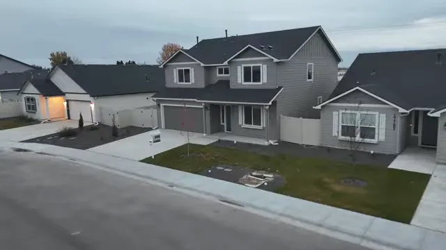 Aerial view of a Nampa neighborhood with homes beside farmland