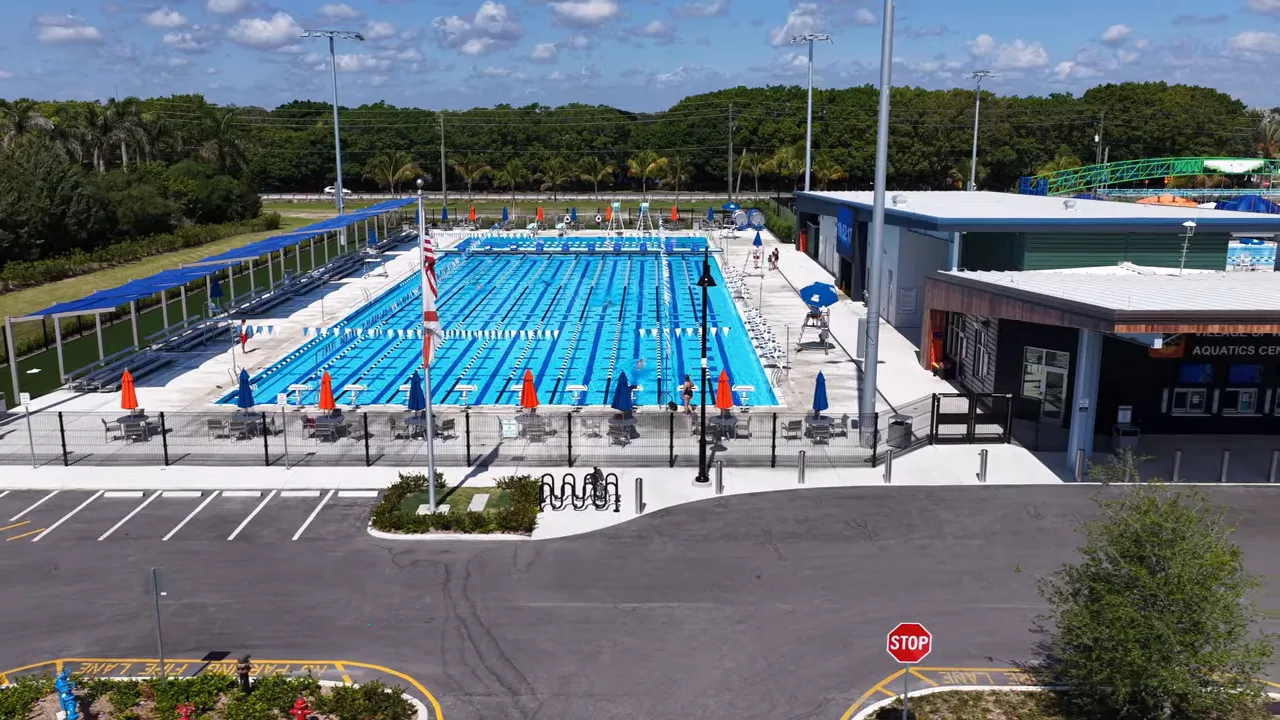 Aerial view of the Wellington Aquatic Center with outdoor competition pools and training facilities