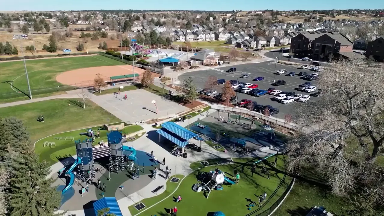 Aerial view of a Denver-area suburban park with playgrounds and outdoor facilities