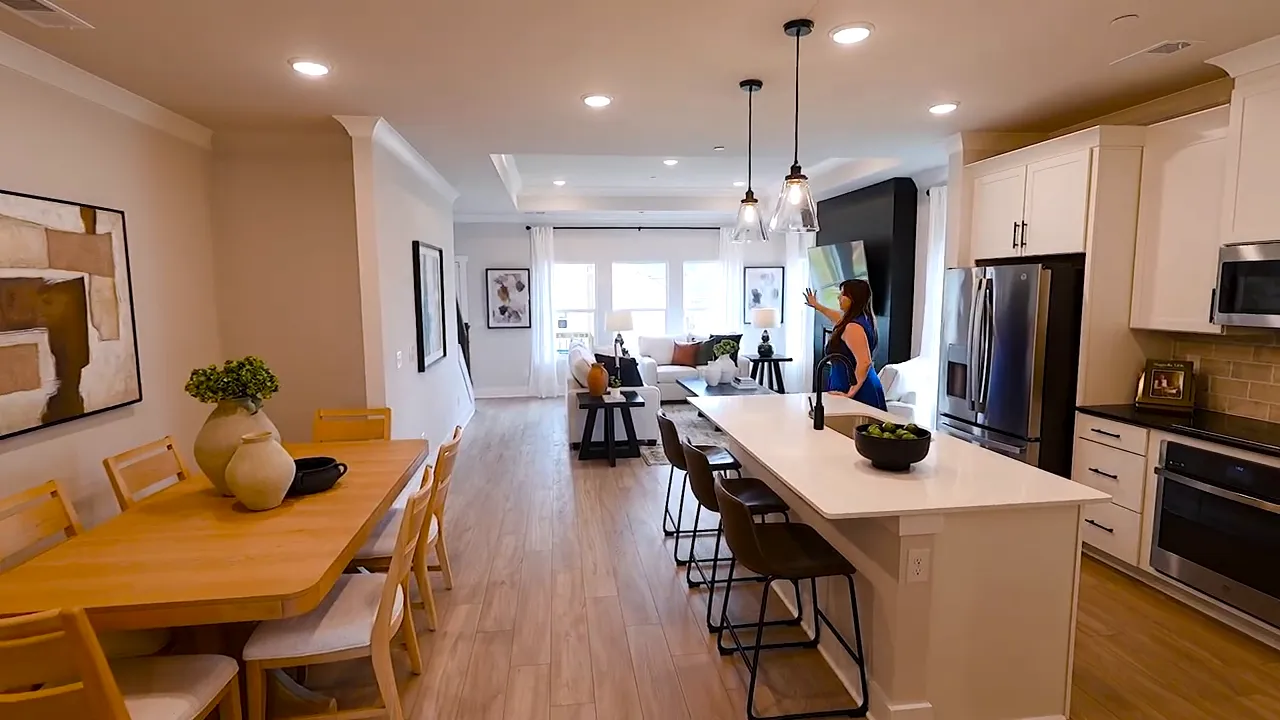 Open kitchen dining room and living area with long island