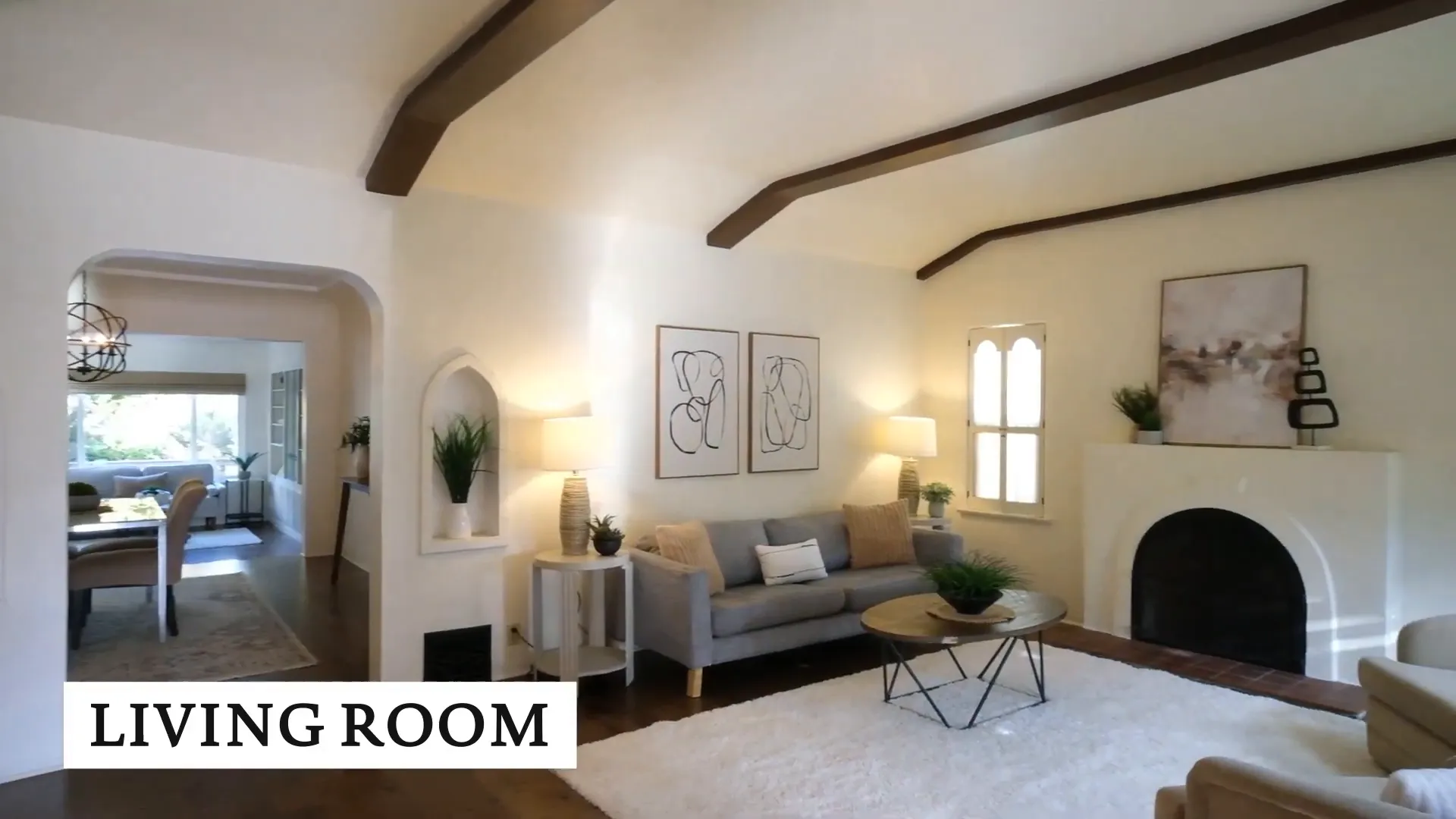 Interior view of living room with barreled ceilings