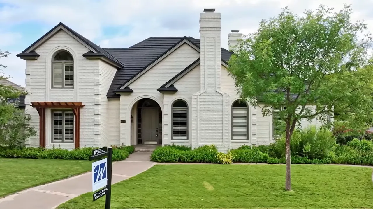 Real estate for sale sign showing affordable housing in Lubbock
