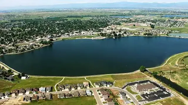Aerial view of Windsor Lake with neighborhoods and trails around the shoreline