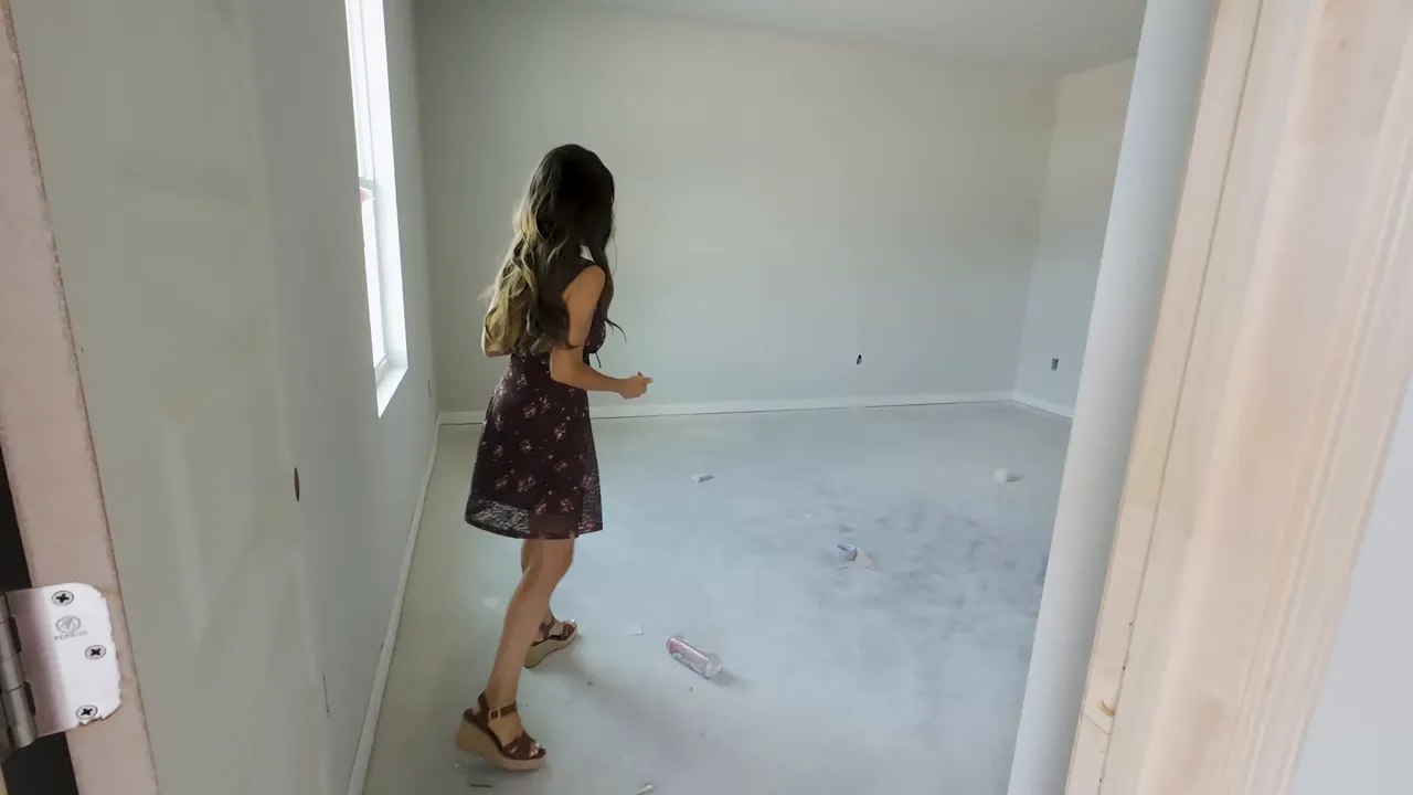 Empty upstairs bedroom space with window natural light in a new construction home in Little River, South Carolina