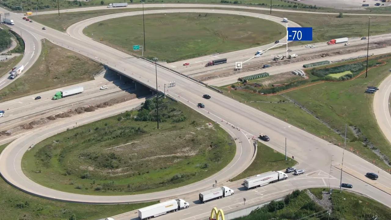 Highway interchange with looping ramps labeled I 70