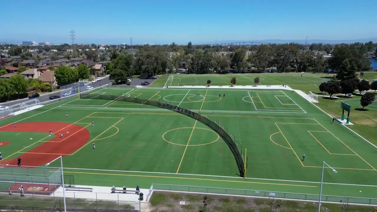 Large athletic fields with soccer and baseball areas viewed from above