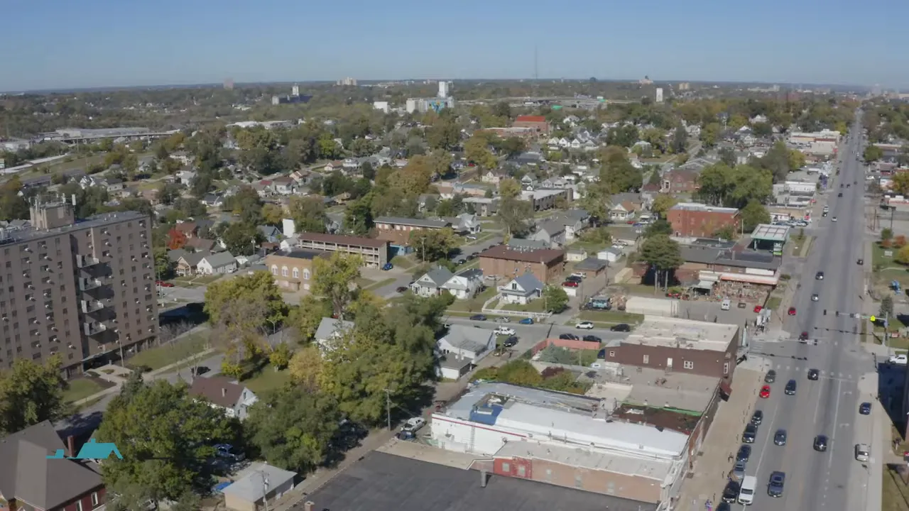 Large historic brick homes on a tree lined Dundee street