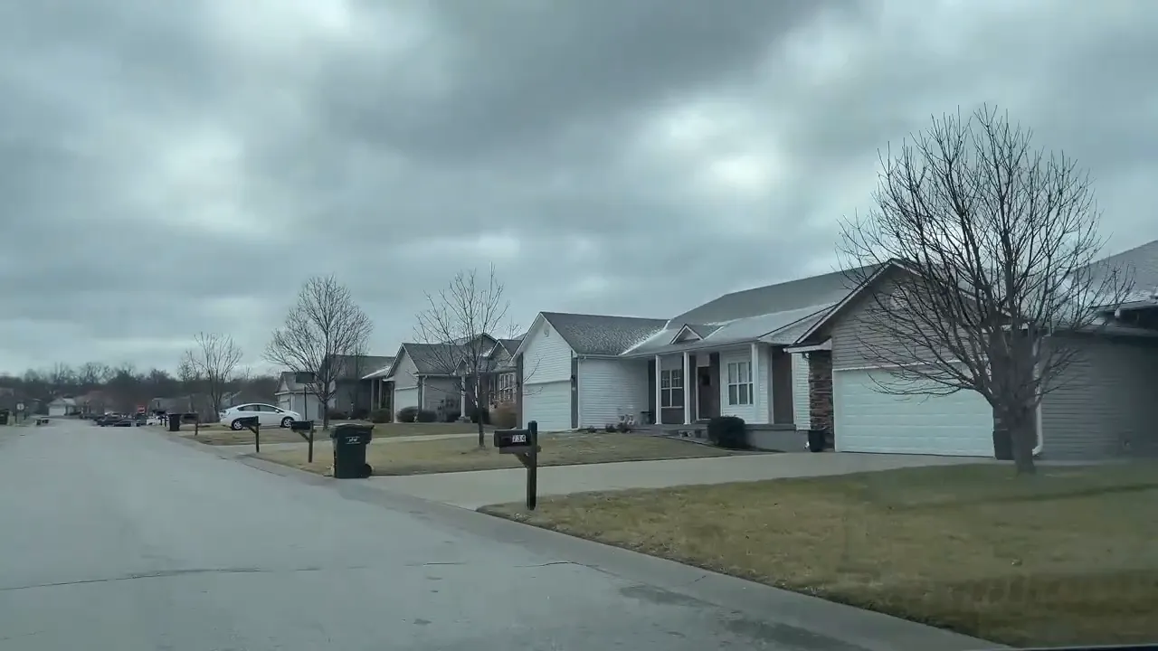 Newer home exterior along an Iron Horse neighborhood street in Warrensburg MO