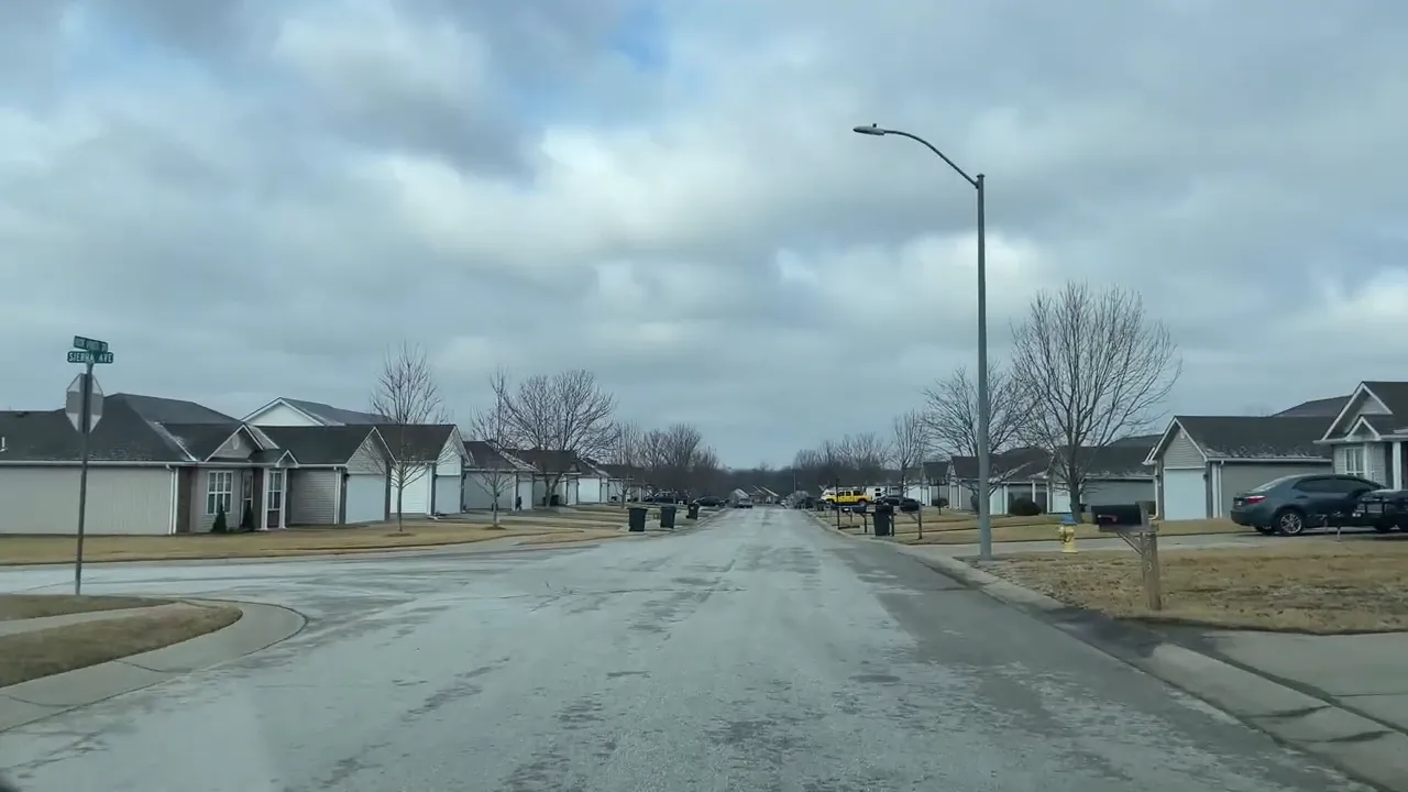 Street view inside Iron Horse neighborhood in Warrensburg Missouri looking down a quiet road