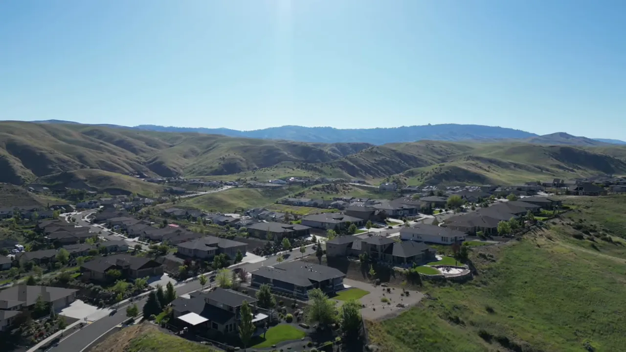 Aerial view of Boise-area suburb neighborhood with rolling hills