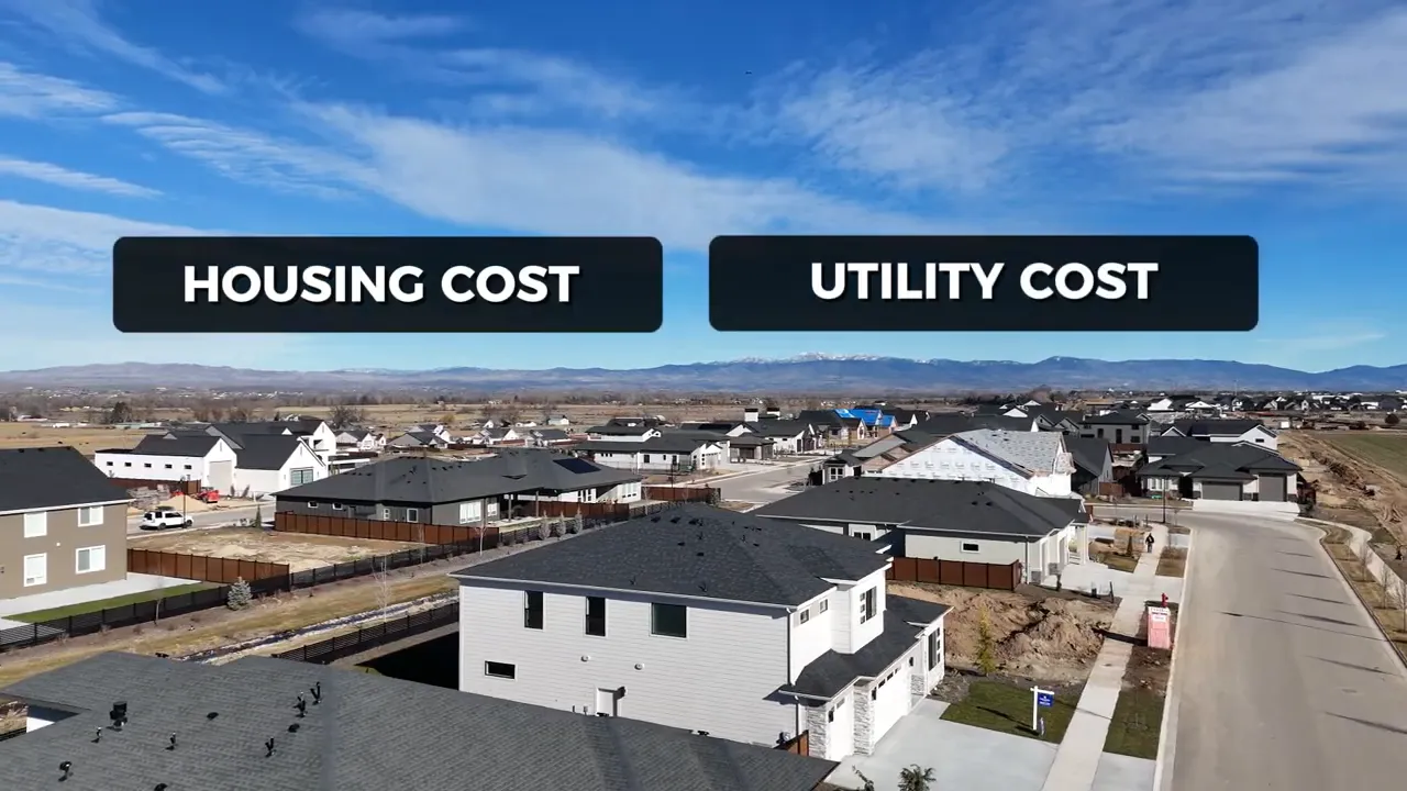 Aerial view of Boise Idaho homes with on-screen labels for housing cost and utility cost