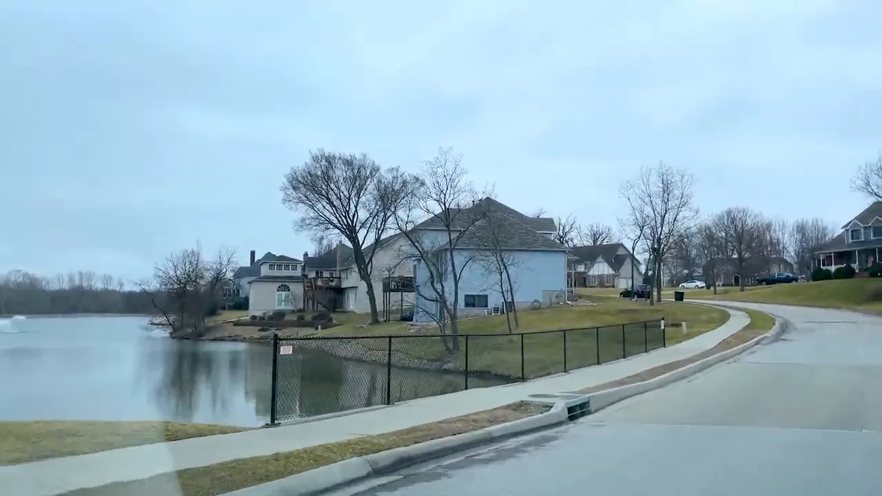 Lake Ridge lakeside neighborhood road with houses and trees
