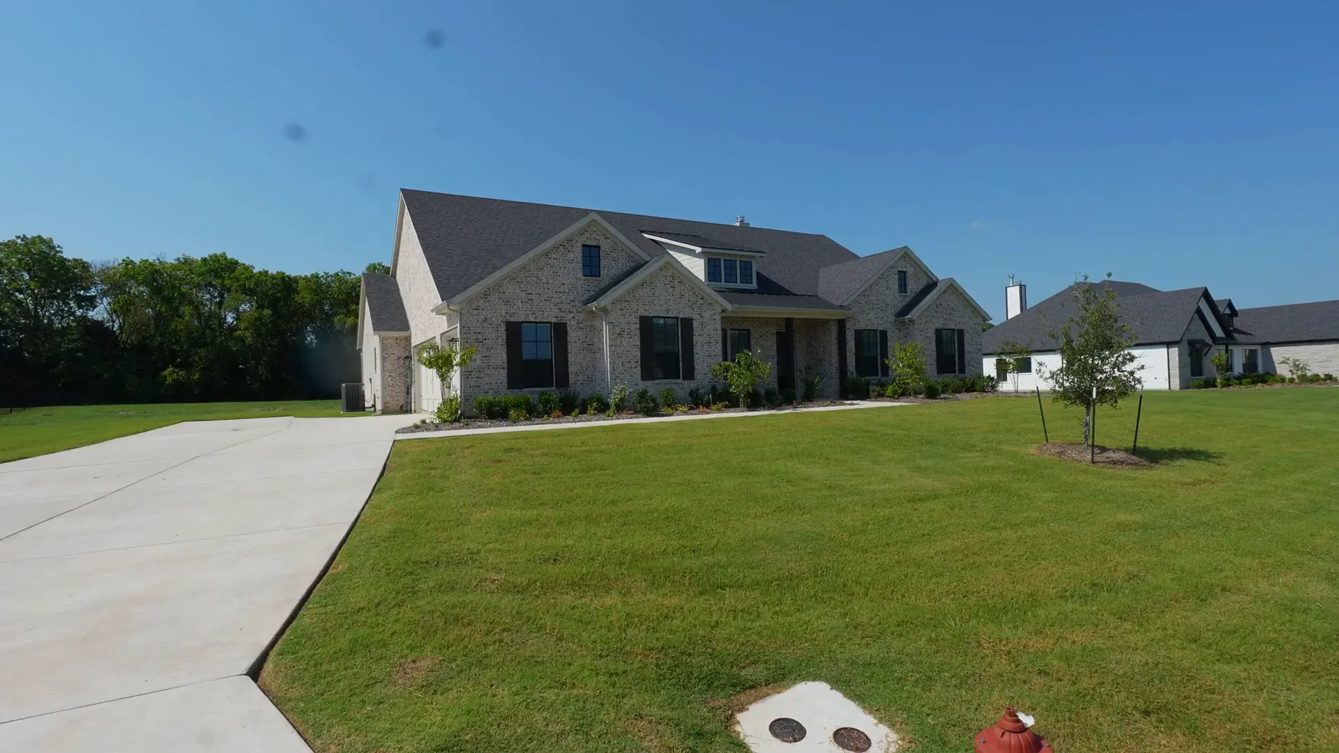 View from the patio across the lot with plenty of side yard